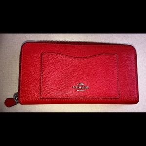 Coach zipper wallet. Never used; no tags.